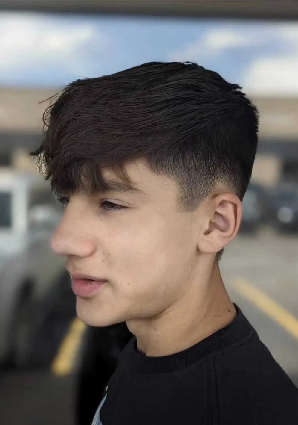 Low Side Fade, Blending into a Long Top Cut and Style